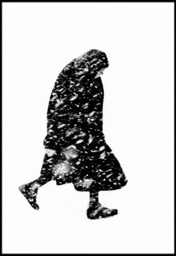 GERMANY. Hamburg. 1954. Old woman in a snowstorm.
